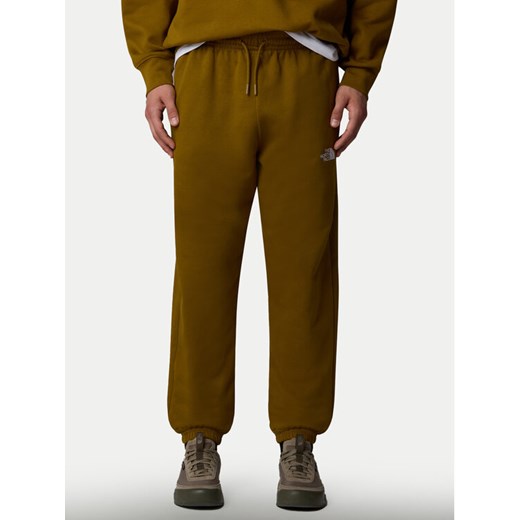 The North Face Spodnie dresowe Essential NF0A8A6J Zielony Relaxed Fit ze sklepu MODIVO w kategorii Spodnie męskie - zdjęcie 185459362
