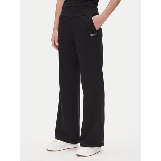 DKNY Sport Spodnie dresowe DP5P3601 Czarny Regular Fit ze sklepu MODIVO w kategorii Spodnie damskie - zdjęcie 185469634