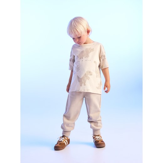 Reserved - Bawełniane spodnie jogger - kremowy Reserved 86 (12-18 m.) Reserved