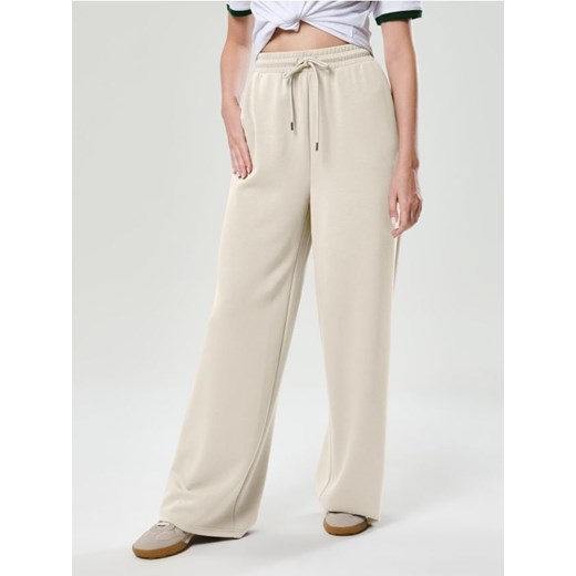 Sinsay - Spodnie soft touch z dodatkiem wiskozy - kremowy ze sklepu Sinsay w kategorii Spodnie damskie - zdjęcie 185493913