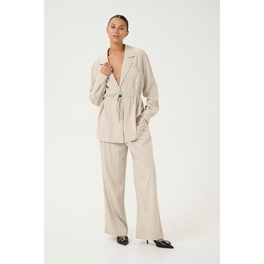 Kaffe Spodnie w kolorze beżowym Kaffe 44 promocyjna cena Limango Polska