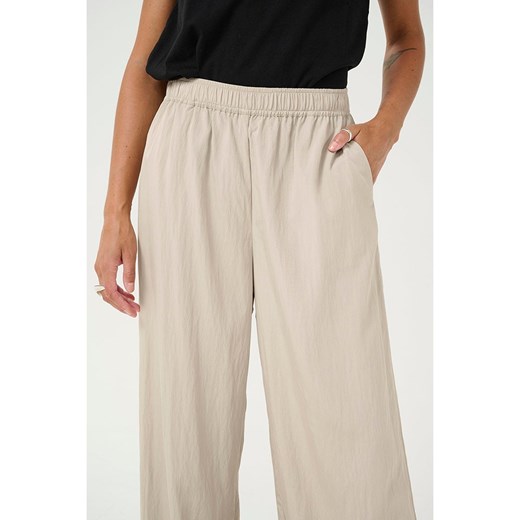 Kaffe Spodnie w kolorze beżowym Kaffe 44 okazja Limango Polska