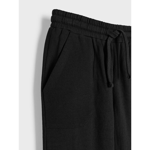 Sinsay - Spodnie dresowe z kieszeniami - czarny Sinsay 164 (13-14 l) Sinsay