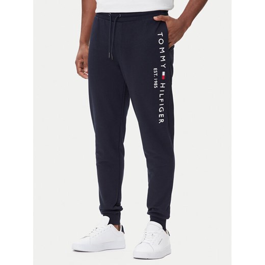 Tommy Hilfiger Spodnie dresowe Basic Branded MW0MW08388 Granatowy Regular Fit ze sklepu MODIVO w kategorii Spodnie męskie - zdjęcie 185570623