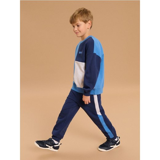 Sinsay - Spodnie loose - mid blue ze sklepu Sinsay w kategorii Spodnie chłopięce - zdjęcie 185580940