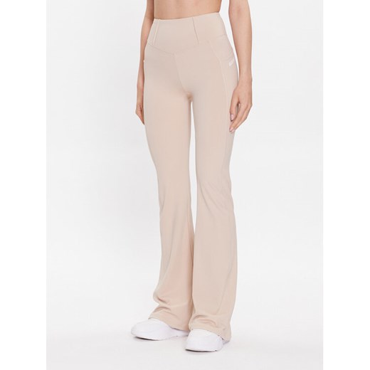 Guess Spodnie materiałowe Brigit V3GB03 MC04Z Beżowy Slim Fit ze sklepu MODIVO w kategorii Spodnie damskie - zdjęcie 185583602