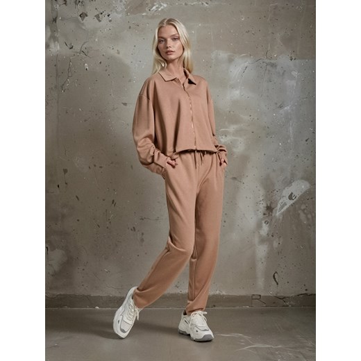 Sinsay - Spodnie soft touch z dodatkiem wiskozy - beżowy Sinsay S Sinsay