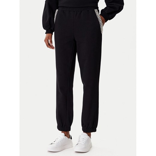 TWINSET Spodnie dresowe 252LI2MDD Czarny Regular Fit ze sklepu MODIVO w kategorii Spodnie damskie - zdjęcie 185602851