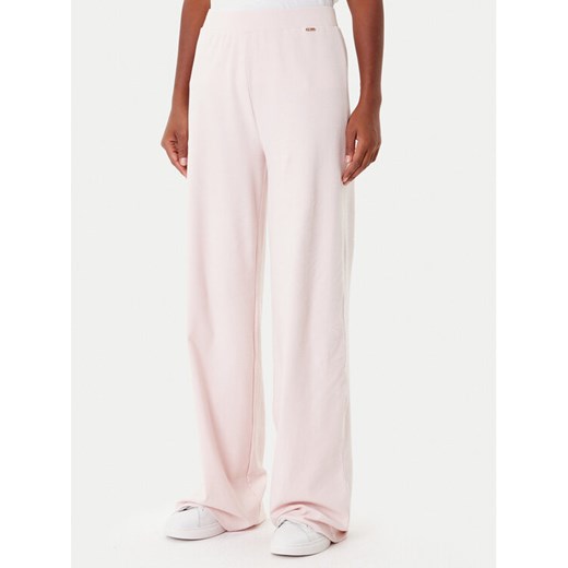 Guess Spodnie dresowe O4BB02 K7611 Różowy Regular Fit ze sklepu MODIVO w kategorii Spodnie damskie - zdjęcie 185634821