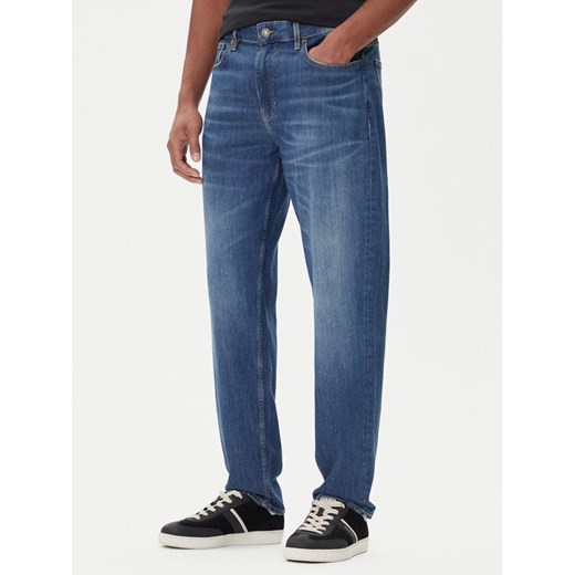 Guess Jeans Jeansy M5BA90 D002C Niebieski Tapered Fit ze sklepu MODIVO w kategorii Jeansy męskie - zdjęcie 185635070