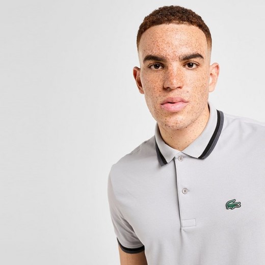 LACOSTE POLO POLO ze sklepu JD Sports  w kategorii T-shirty męskie - zdjęcie 185652832