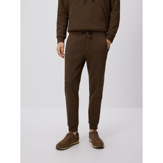 Reserved - Spodnie dresowe slim fit - brązowy ze sklepu Reserved w kategorii Spodnie męskie - zdjęcie 185677682
