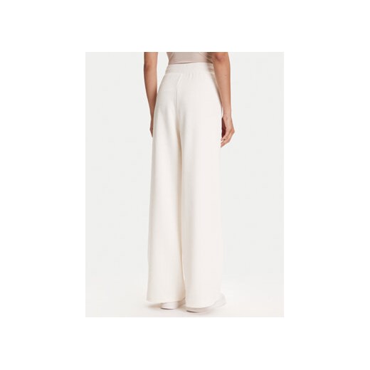 Guess Spodnie dresowe V5YB19 KBSL2 Écru Regular Fit Guess XXS MODIVO