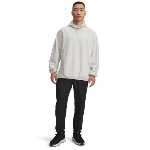 Męskie spodnie treningowe Under Armour UA Unstoppable Tapered Pants - czarne ze sklepu Sportstylestory.com w kategorii Spodnie męskie - zdjęcie 185736812