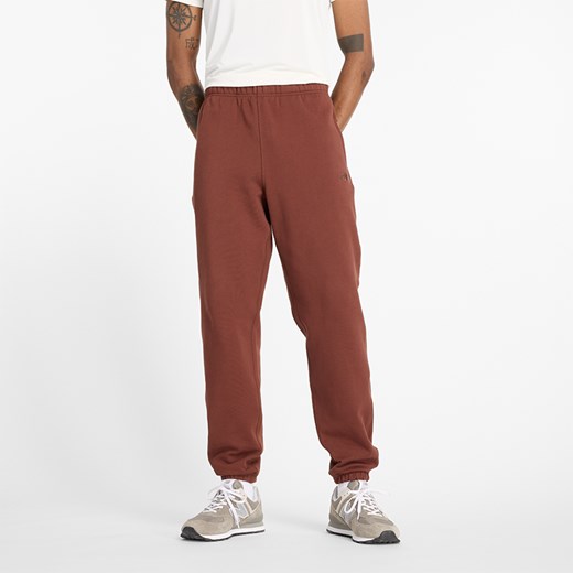 Spodnie męskie New Balance MP41508ROK – brązowe ze sklepu New Balance Poland w kategorii Spodnie męskie - zdjęcie 185752603