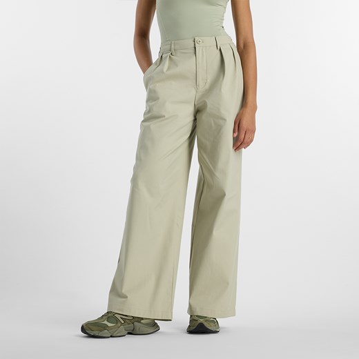 Spodnie damskie New Balance WP51538OVN – beżowe ze sklepu New Balance Poland w kategorii Spodnie damskie - zdjęcie 185752960