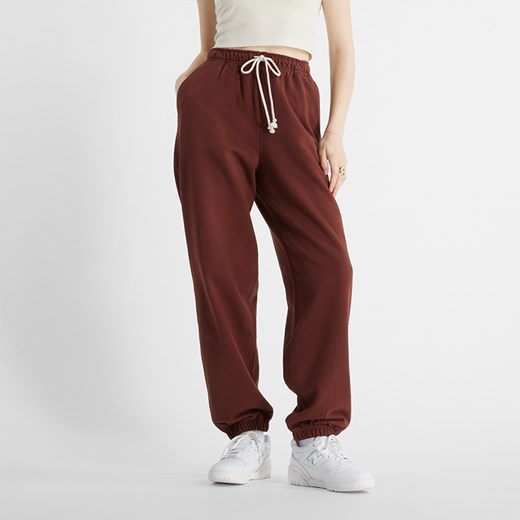 Spodnie damskie New Balance WP41513ROK – brązowe ze sklepu New Balance Poland w kategorii Spodnie damskie - zdjęcie 185753113