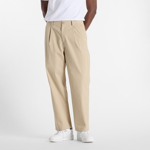 Spodnie męskie New Balance MP51563SOT – beżowe ze sklepu New Balance Poland w kategorii Spodnie męskie - zdjęcie 185753294