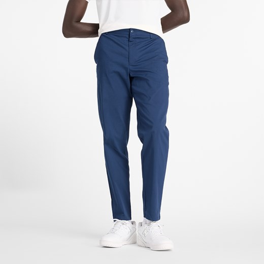 Spodnie męskie New Balance MP43554NNY – granatowe ze sklepu New Balance Poland w kategorii Spodnie męskie - zdjęcie 185753352