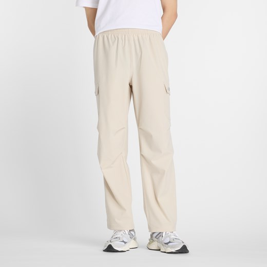 Spodnie męskie New Balance MP51538TWF – beżowe ze sklepu New Balance Poland w kategorii Spodnie męskie - zdjęcie 185753452
