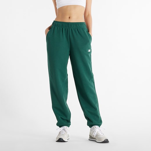 Spodnie damskie New Balance WP41500NWG – zielone ze sklepu New Balance Poland w kategorii Spodnie damskie - zdjęcie 185753491