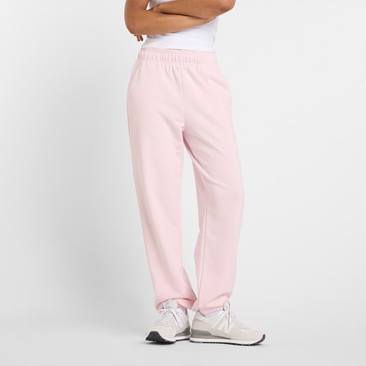 Spodnie damskie New Balance WP41500RSG – różowe ze sklepu New Balance Poland w kategorii Spodnie damskie - zdjęcie 185753754