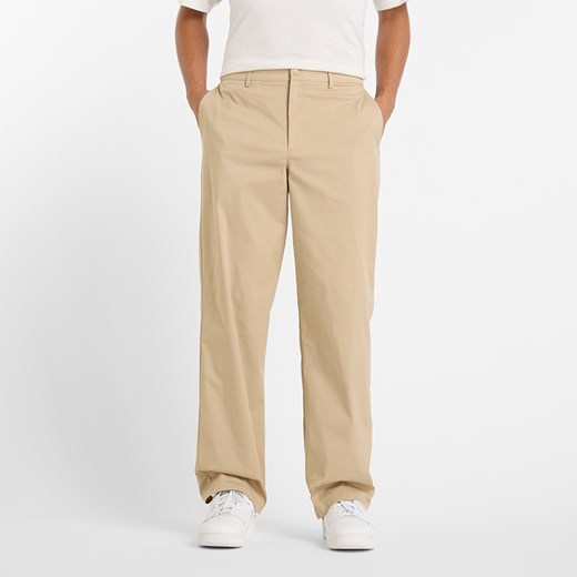 Spodnie męskie New Balance MP43560SOT – beżowe ze sklepu New Balance Poland w kategorii Spodnie męskie - zdjęcie 185754232