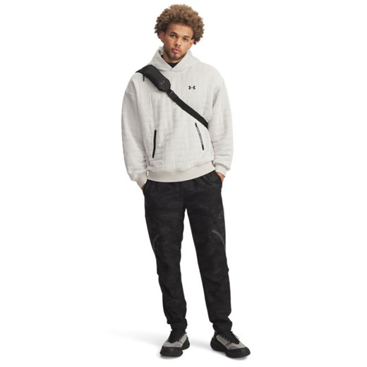 Męskie spodnie treningowe cargo UA Unstoppable Cargo Pant - czarne ze sklepu Sportstylestory.com w kategorii Spodnie męskie - zdjęcie 185755751