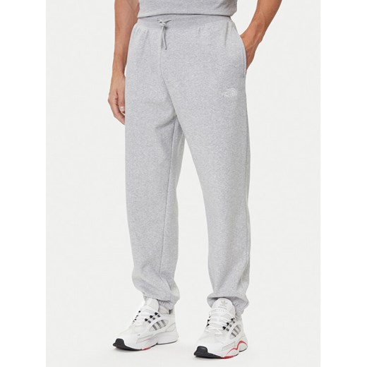 The North Face Spodnie dresowe Essential NF0A8C1F Szary Relaxed Fit ze sklepu MODIVO w kategorii Spodnie męskie - zdjęcie 185792820