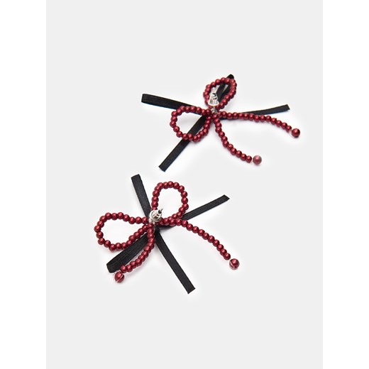Sinsay - Kolczyki z koralikami w kształcie kokardy - wielobarwny Sinsay One Size Sinsay