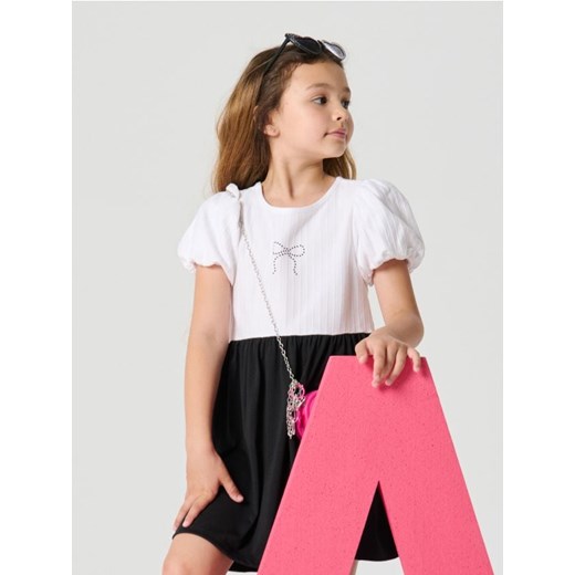 Sinsay - Dwukolorowa sukienka z bufkami i ozdobną kokardką - czarny ze sklepu Sinsay w kategorii Sukienki dziewczęce - zdjęcie 185811944