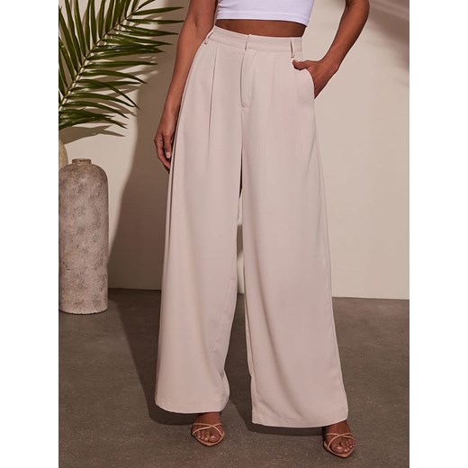 LA Angels Spodnie w kolorze kremowym La Angels L wyprzedaż Limango Polska