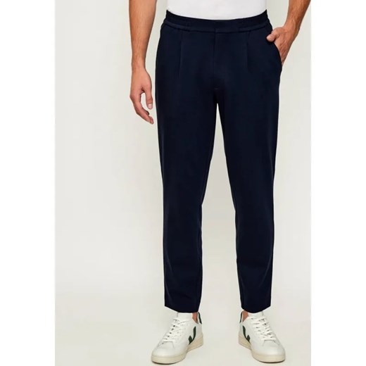 Calvin Klein Spodnie | Tapered fit ze sklepu Gomez Fashion Store w kategorii Spodnie męskie - zdjęcie 185831684
