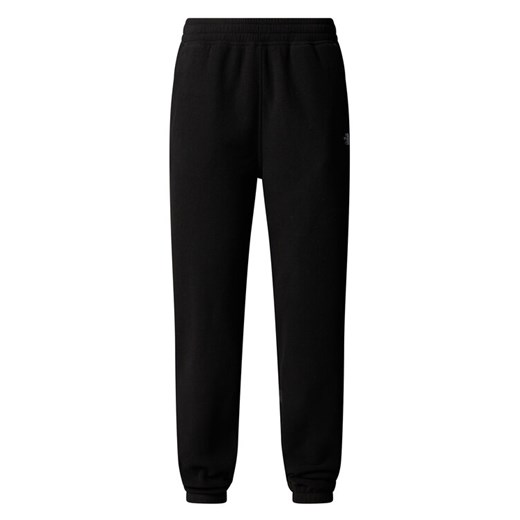 The North Face Spodnie dresowe Glacier NF0A8DQR Czarny Regular Fit ze sklepu MODIVO w kategorii Spodnie damskie - zdjęcie 185833763