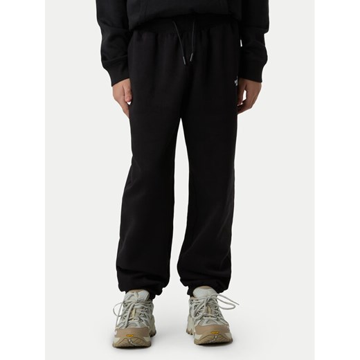 The North Face Spodnie dresowe Essential NF0A8BHS Czarny Regular Fit ze sklepu MODIVO w kategorii Spodnie dziewczęce - zdjęcie 185834052