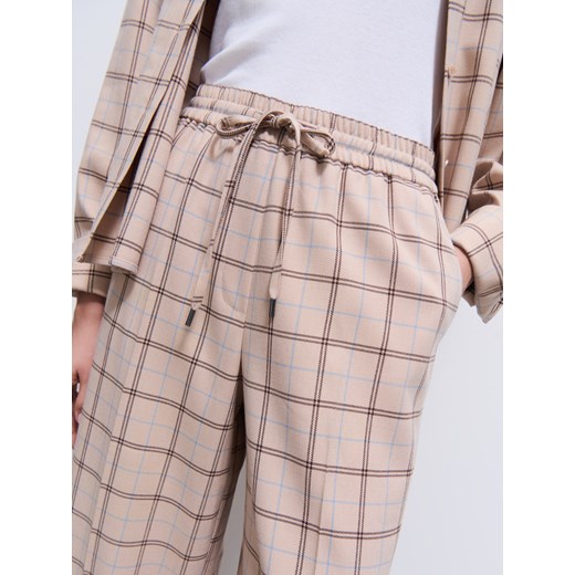 Mohito - Spodnie w kratę - beżowy Mohito 38 Mohito