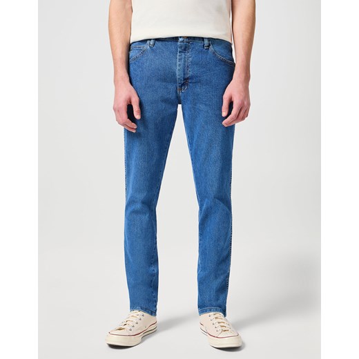 MĘSKIE SPODNIE JEANSOWE WRANGLER RUSTLER SLIM INDIGO MID W10ERC81D 112342563 ze sklepu YouNeedit.pl w kategorii Jeansy męskie - zdjęcie 185847044