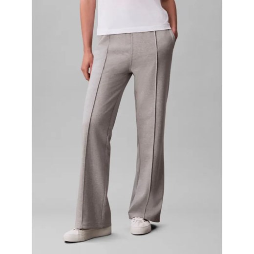 Calvin Klein Jeans Spodnie dresowe | flare fit ze sklepu Gomez Fashion Store w kategorii Spodnie damskie - zdjęcie 185858943
