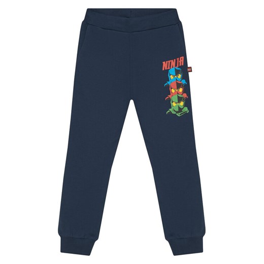 LEGO Spodnie dresowe 11010946 Granatowy Regular Fit ze sklepu MODIVO w kategorii Spodnie chłopięce - zdjęcie 185869080