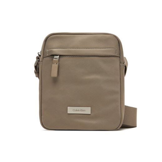 Calvin Klein Saszetka Sleek Reporter LV04D3180G Beżowy ze sklepu MODIVO w kategorii Torby męskie - zdjęcie 185869881