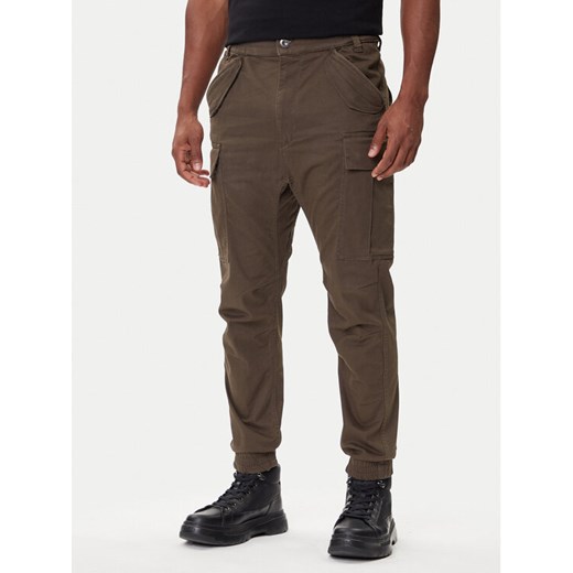 Alpha Industries Joggery Airman 188201 Zielony Tapered Fit ze sklepu MODIVO w kategorii Spodnie męskie - zdjęcie 185914043