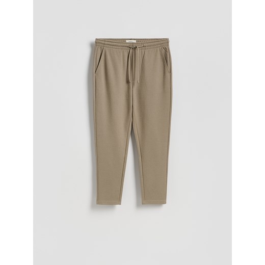 Reserved - Spodnie regular fit - beżowy Reserved XL Reserved