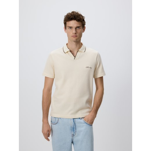 Reserved - Strukturalne polo comfort fit - złamana biel ze sklepu Reserved w kategorii T-shirty męskie - zdjęcie 185933690