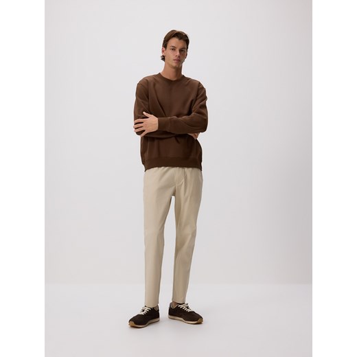 Reserved - Spodnie jogger slim - złamana biel ze sklepu Reserved w kategorii Spodnie męskie - zdjęcie 185938270