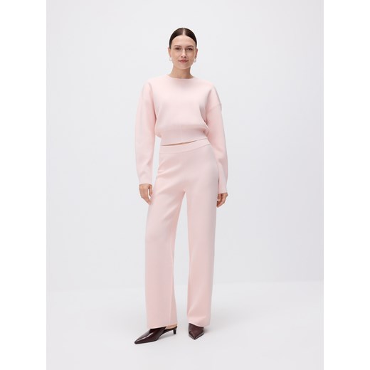 Reserved - Szerokie spodnie z wiskozą - pastelowy róż ze sklepu Reserved w kategorii Spodnie damskie - zdjęcie 185938391