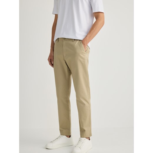 Reserved - Spodnie chino slim fit - beżowy ze sklepu Reserved w kategorii Spodnie męskie - zdjęcie 185939823