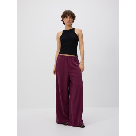 Reserved - Luźne spodnie z wiskozą - burgundowy ze sklepu Reserved w kategorii Spodnie damskie - zdjęcie 185942820