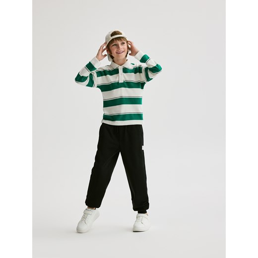 Reserved - Bawełniane spodnie jogger - czarny - id: 783DO-99X - marki Reserved - 185944773 Reserved - Bawełniane spodnie jogger - czarny ze sklepu Reserved w kategorii Spodnie chłopięce - zdjęcie 185944773