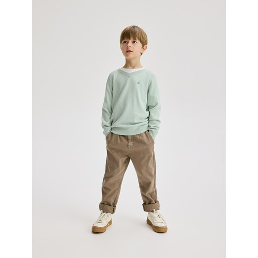 Reserved - Gładki sweter z wiskozą - jasnozielony Reserved 122 (6-7 lat) promocyjna cena Reserved