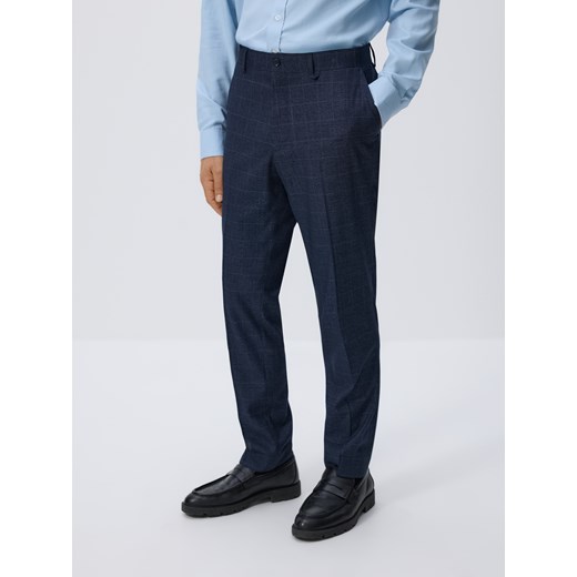 Reserved - Spodnie garniturowe slim fit - granatowy ze sklepu Reserved w kategorii Spodnie męskie - zdjęcie 185946340